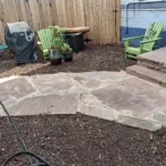 Concrete patio installation in progress at a Denver home